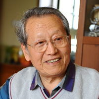 娄际成