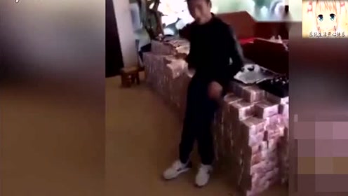 男子炫富,1亿现金摆成墙,这场面小编也是第一次见啊!