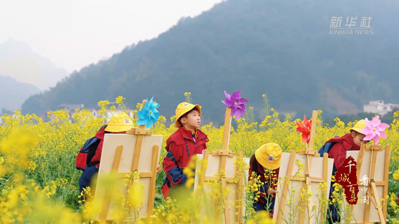 千城百县看中国︱湖南新宁:八角寨下油菜花开