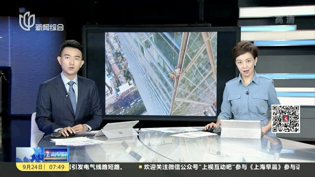 江苏镇江:突遇大风 3名玻璃清洁工被困200米高空