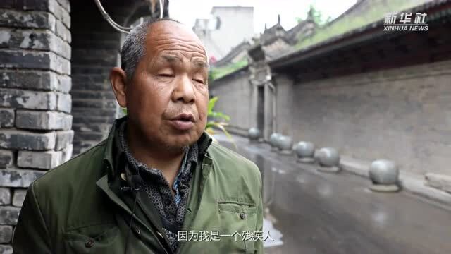 盲人张喜平:脚下有路 心中有光