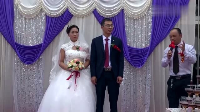 河南婚礼,新郎新娘在举办婚礼,新娘长得好漂亮