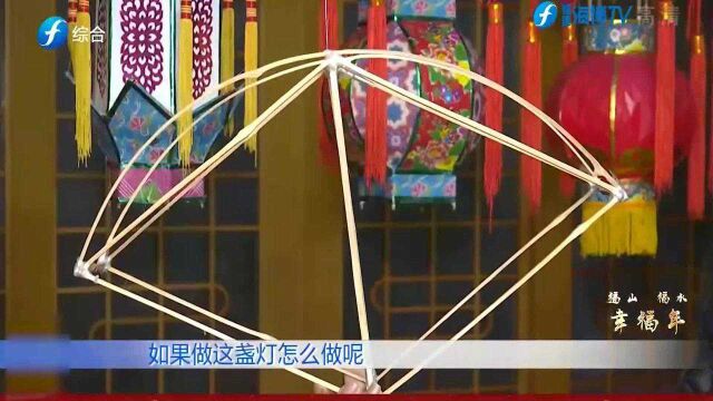 新年到来之际,市民用一纸“合扇”一朵“红花”恭祝新春