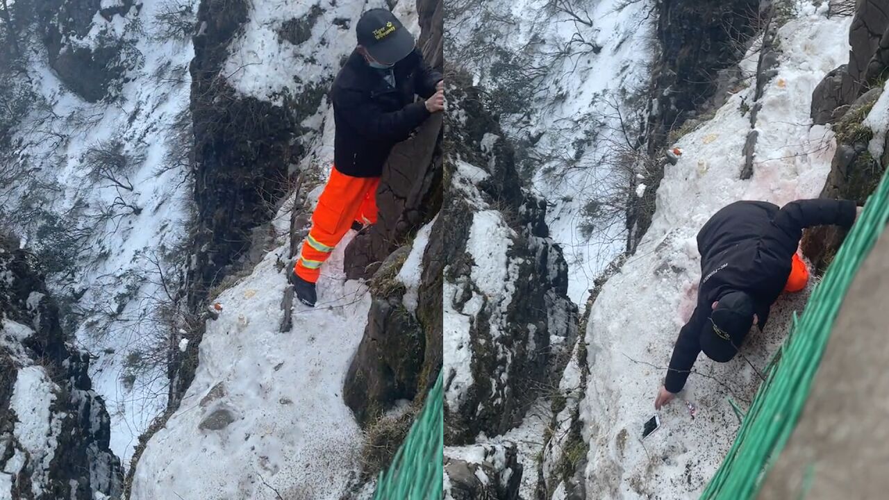 峨眉山工作人员未系安全绳,下悬崖帮游客捡手机,景区回应