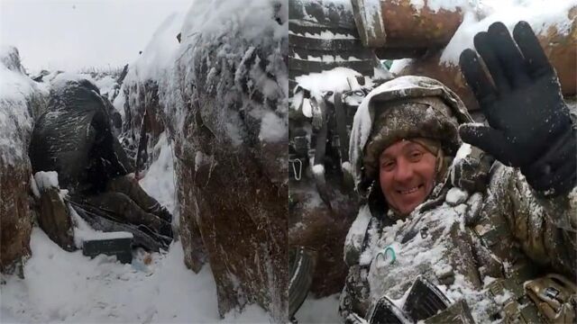 好乐观!乌士兵在大雪纷飞的战壕中休息,笑嘻嘻地对着镜头打招呼