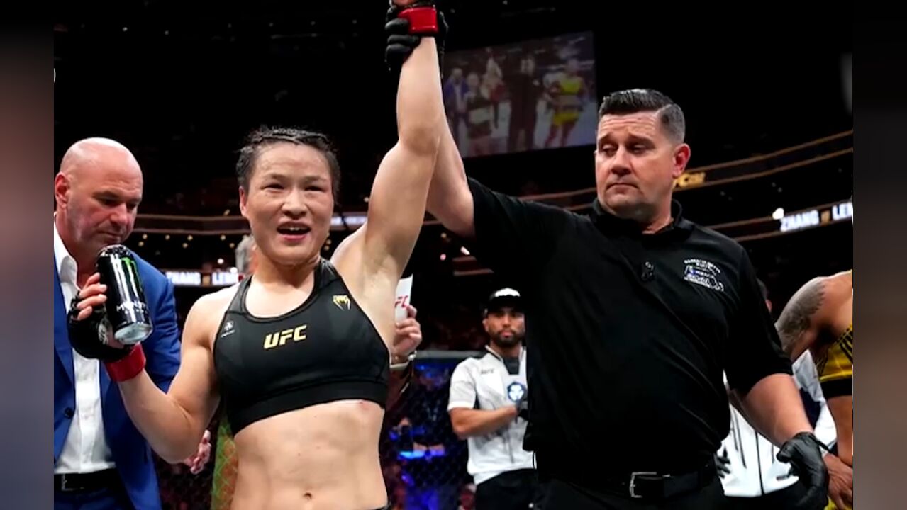 终极格斗冠军赛(UFC)292比赛,张伟丽卫冕女子草量级金腰带