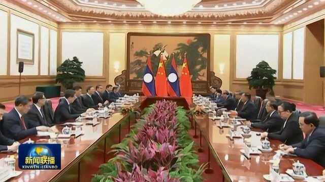 习近平同老挝人革党中央总书记、国家主席本扬举行会谈