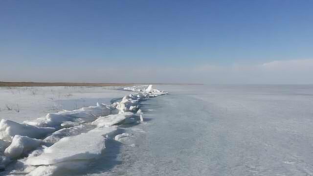 壮观!中国最大内陆淡水湖现推冰奇观:绵延数公里,咔咔巨响