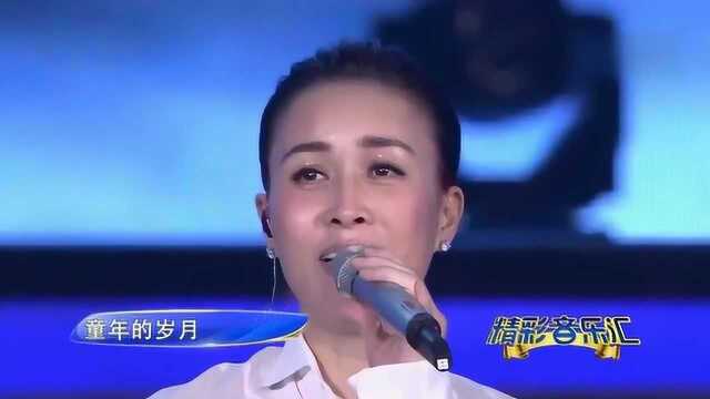 歌曲《小背篓》演唱:那英