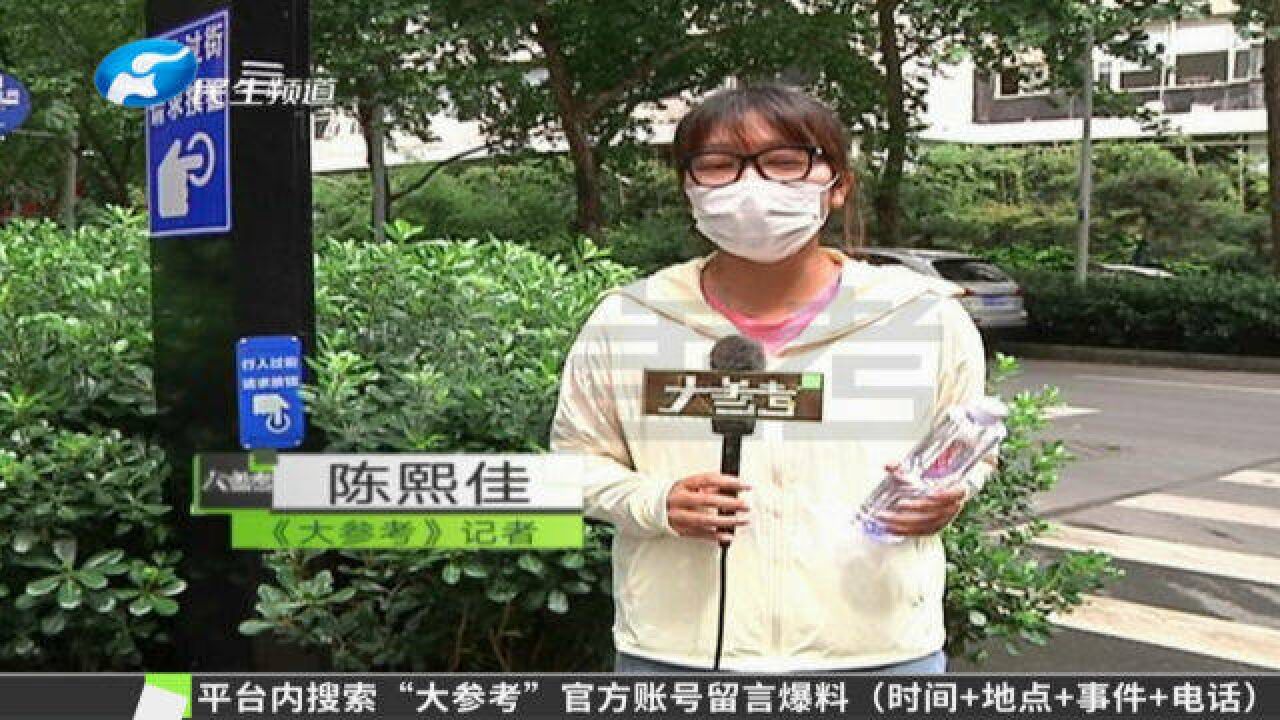 郑州交警对行人过街需求大的路段设置触摸式人行横道信号灯,避免信号灯空放