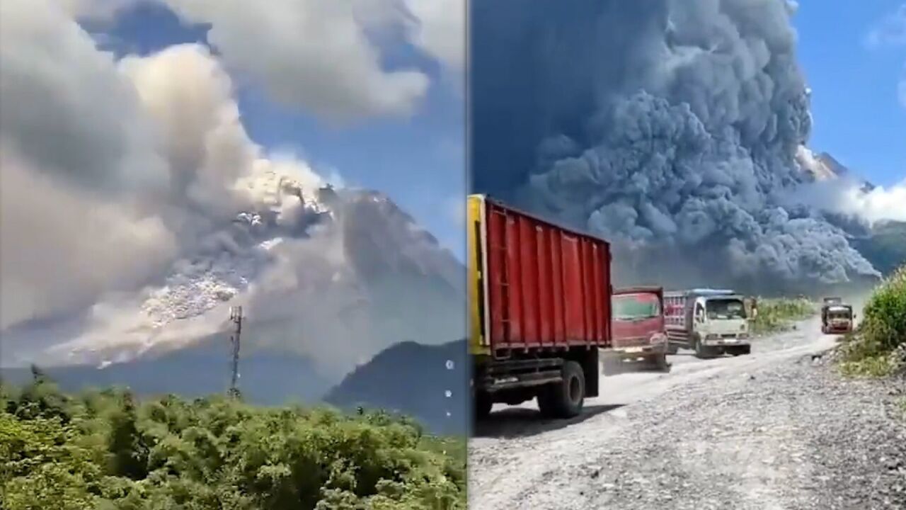 印尼火山喷发形成3000米高火山云 大批卡车烟雾笼罩下结队撤离