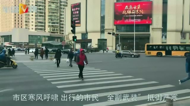 冷冷冷!岛城气温嗖嗖降,市民出行“全副武装”