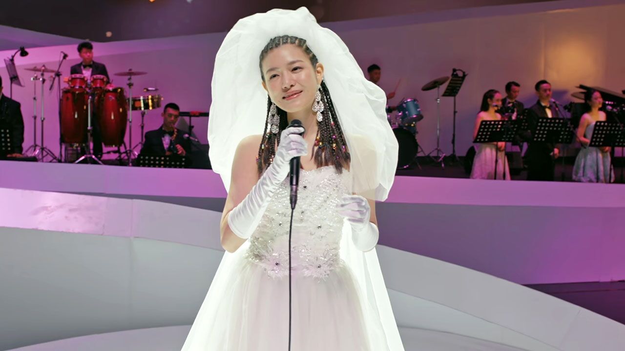 但愿人长久丨邓丽君在演唱会身着婚纱!一曲终了众人泪流满面