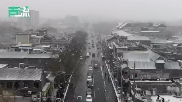 瑞雪飘飘 大北京倏地“慢”下来