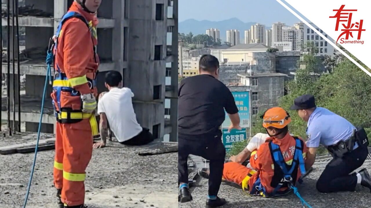 奋不顾身!男子楼顶欲轻生 危急时刻消防员纵身一跃救回