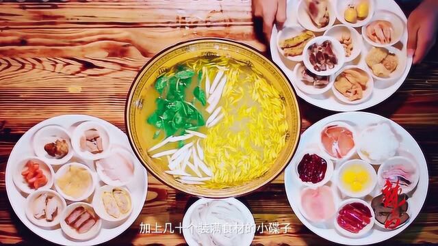 一碗比脸还大的海碗加上几十个装满食材的小碟子