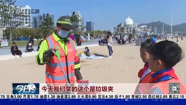 崂山区组织开展“城市美容师”市民体验活动