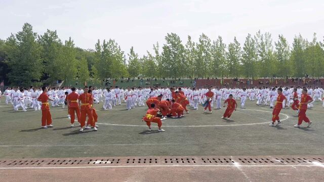 鸡公山武校受邀参加信阳市农林学院第九届田径运动会开幕式