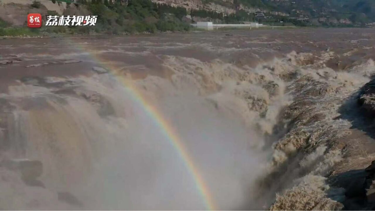 金涛澎湃!黄河壶口瀑布现“彩桥通天”奇观