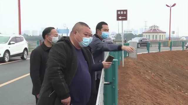 我市长春垸西线堤顶道路硬化工程建设进入扫尾阶段