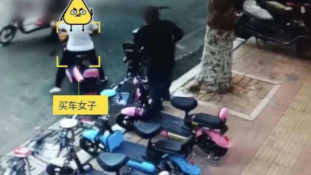 还未付款店主就给开了收据,女子径直骑走电动车