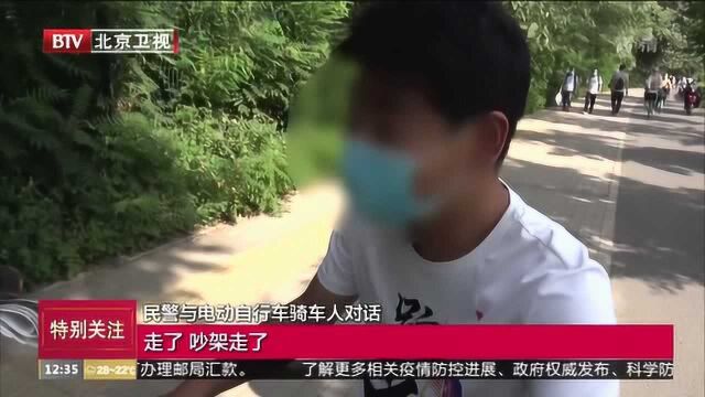 电动车违规载人高发 警方早高峰集中整治