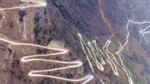 航拍体验凉山“天路”：12公里22个回弯 垂直高差800多米