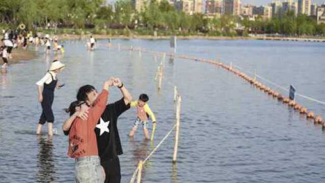 夏天还没到 金华这处沙滩已开启戏水模式