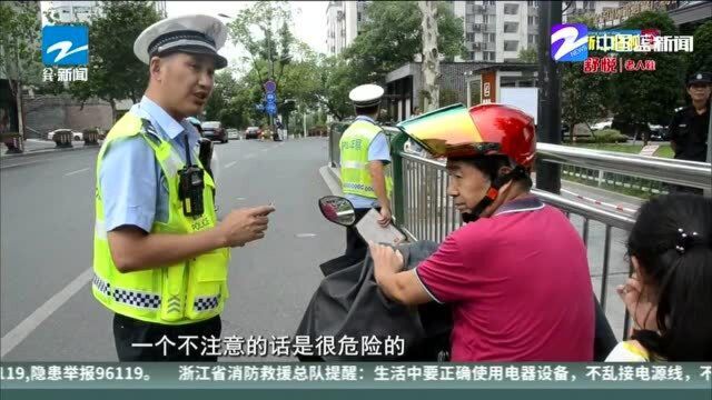 金华交警开启电动车闯红灯铁拳整治行动