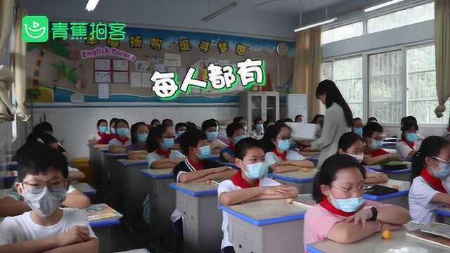 六年级学生最后一次过六一学校发枇杷庆祝 学生:心里酸酸的