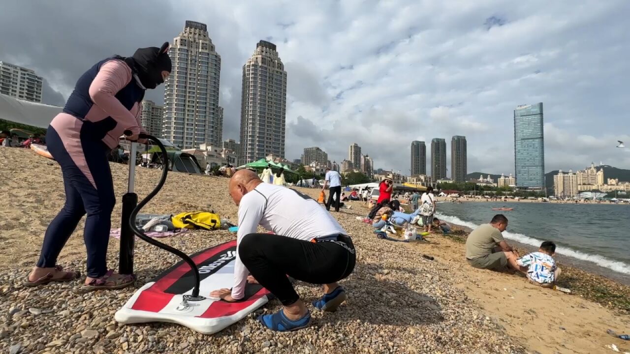 爽!大连海滩花式玩海开始啦