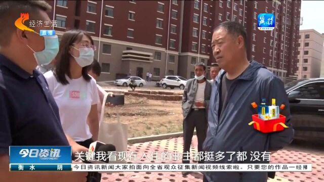 小区路面、绿化没完工,开发商就违规交房,竣工验收报告让人吃惊