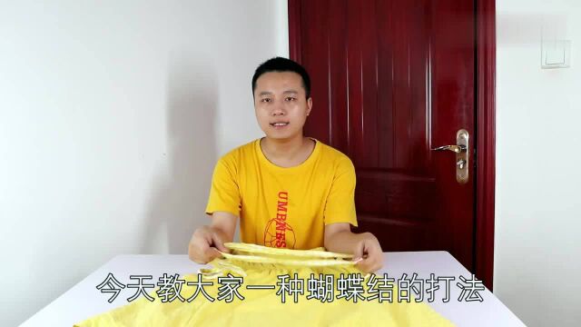 漂亮蝴蝶结的打法,大衣和连衣裙都适合,手法简单,一看就会