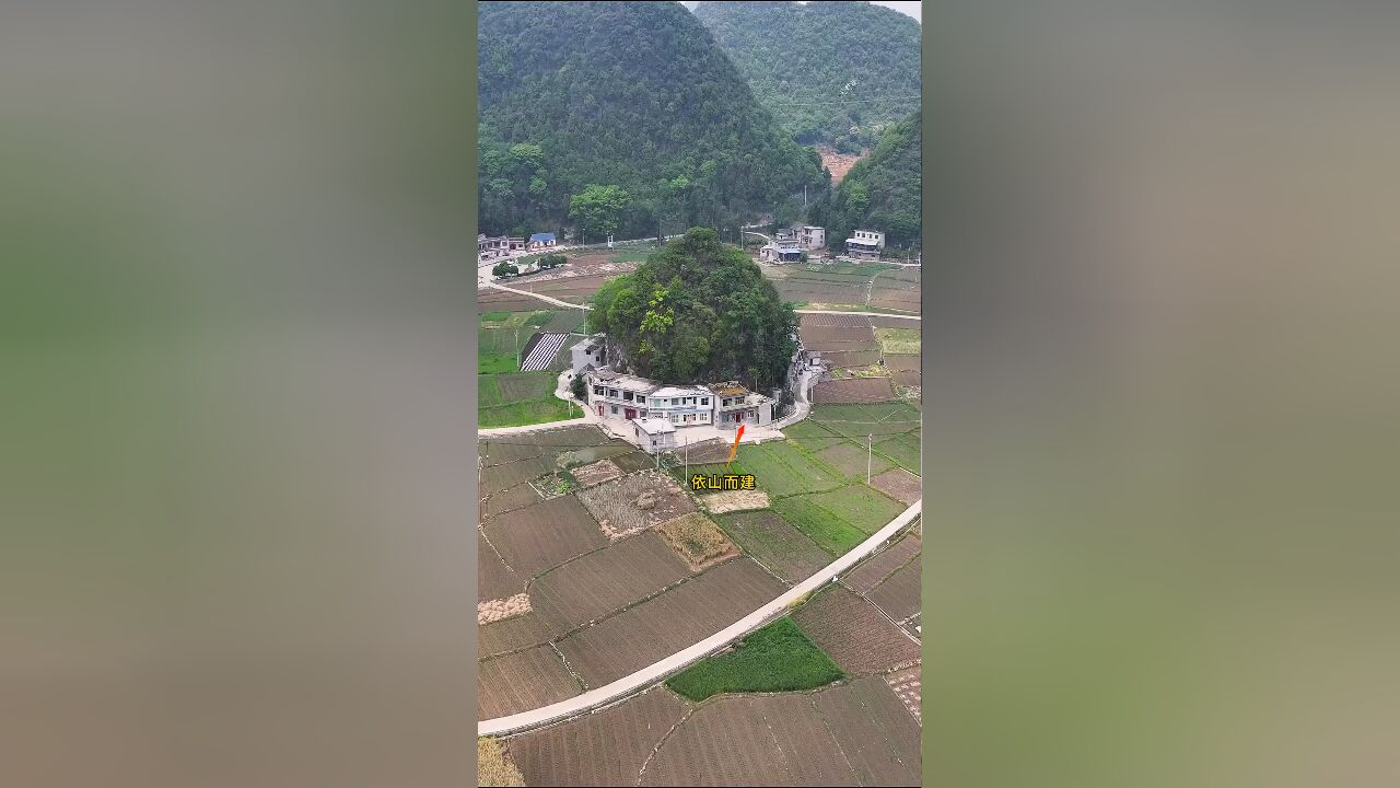 贵州深山里的一个小村庄,房子整齐有序地依山而建