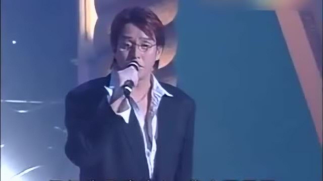 谭咏麟演唱《假如我是真的》