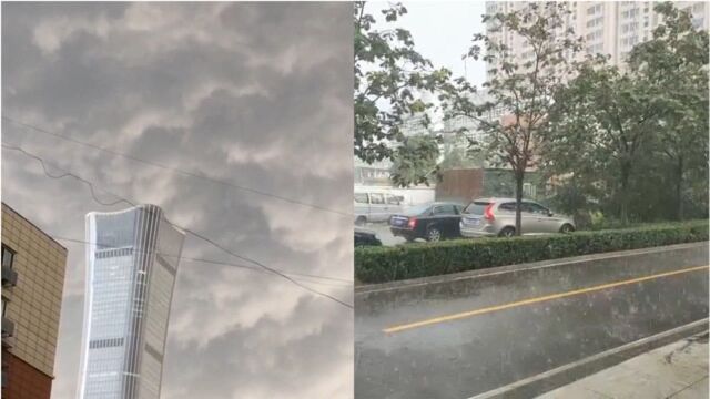 30秒实拍北京狂风骤雨:雷声轰隆黑云遮天 雨点冰雹砸地溅起水花