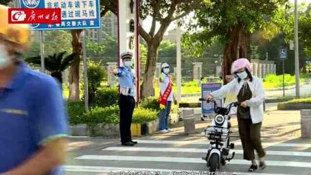 广州番禺区交通文明指数大幅提升:市民头盔佩戴渐成习惯