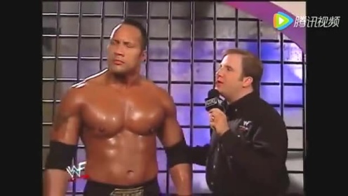 WWE 当年巨石强森一挑二秒杀艾吉