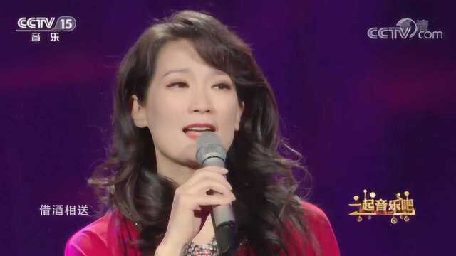 《九百九十九朵玫瑰》演唱:杨竹青