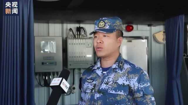 黄海海域 海军信阳舰组织舰机协同反潜训练