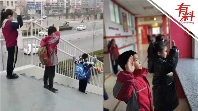 小学生上学路上听到国歌声立即肃立敬礼 网友点赞:少年强则国强