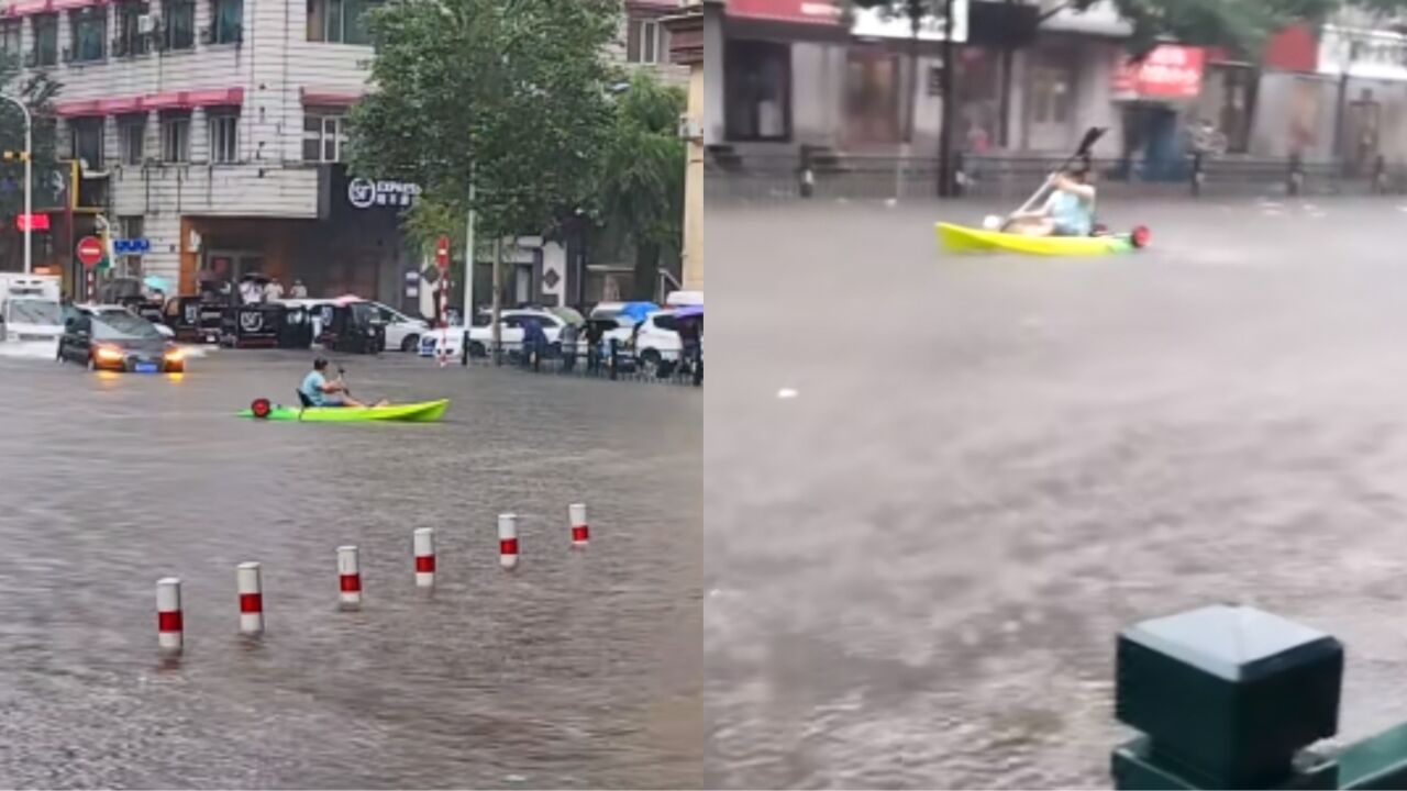 哈尔滨发布暴雨红色预警,街道成河流,市民直接划船出行