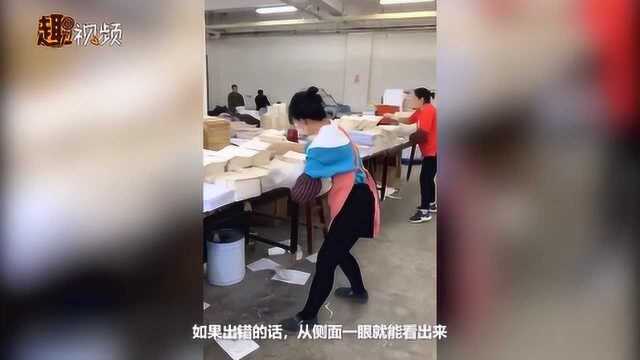 印刷厂女工加班“开挂”配页子 像极了努力为你印寒假作业的样子