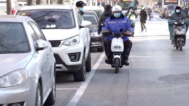 管理员边骑边拍!北京48条道路路侧车位推行移动拍照计费