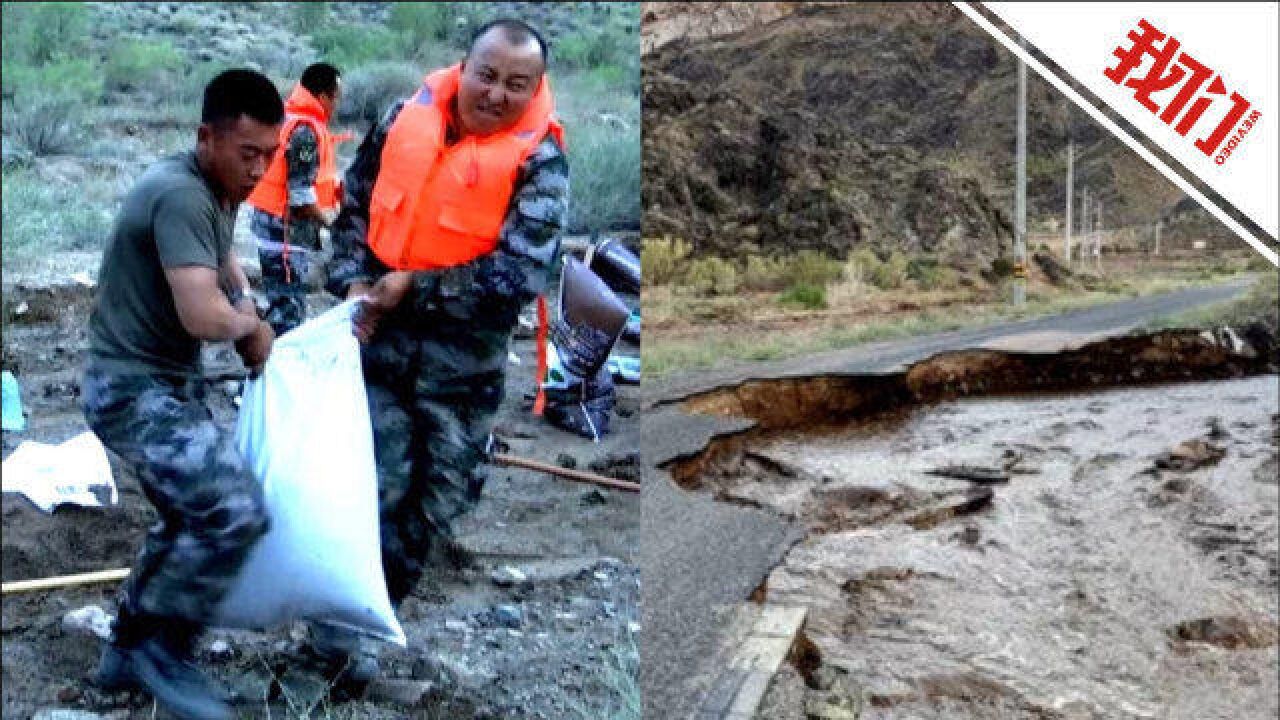 新疆阿拉山口突发山洪道路被冲毁 官兵扛起沙袋逆行而上