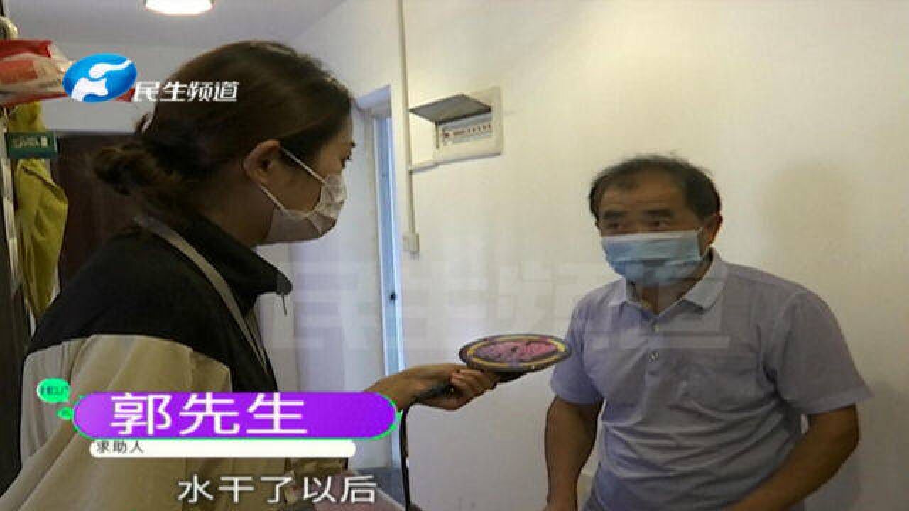 河南新郑:遭遇强对流天气,家中积水地板泡了汤,物业来解决