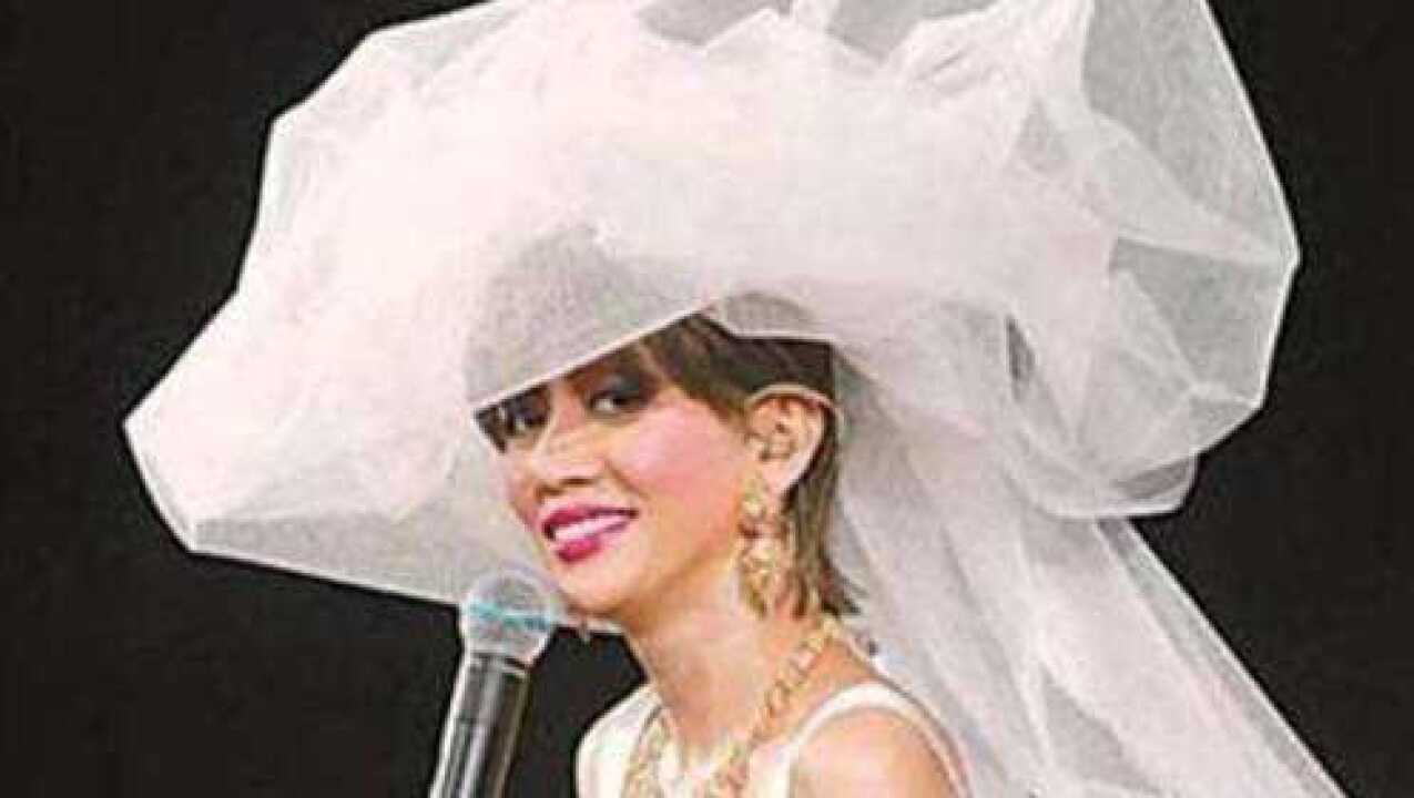 梅艳芳最后一次演唱会为什么会穿婚纱当年的设计师说出了实情