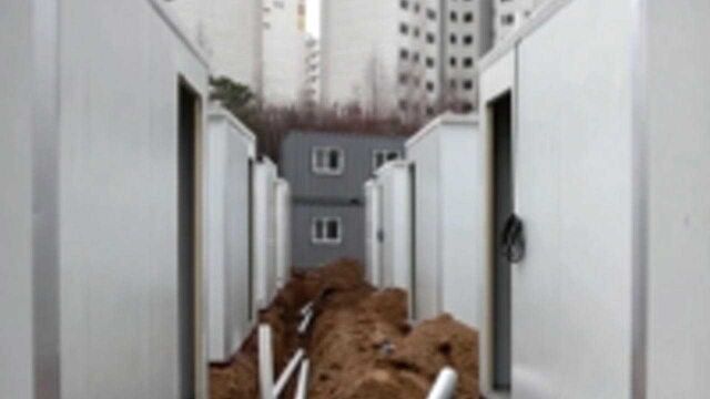 第三波新冠疫情来袭 韩国建“集装箱医院”应对床位短缺