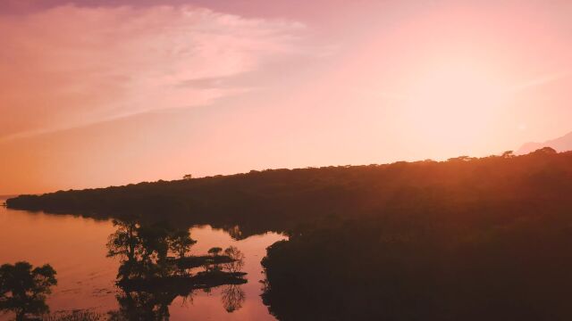 海边夕阳红霞海岸航拍