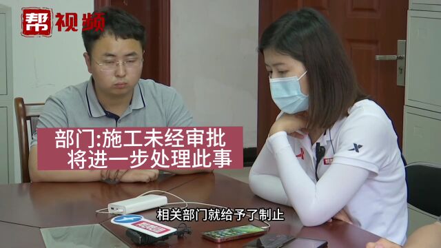 小区家门口绿地被改造成停车场 业主痛心求助 部门:已叫停施工